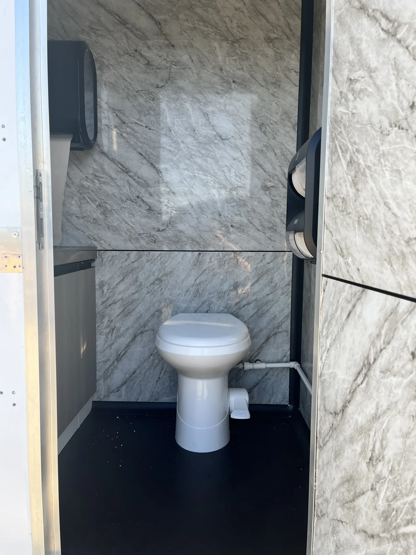 Luxury restroom trailer set up for a wedding event
